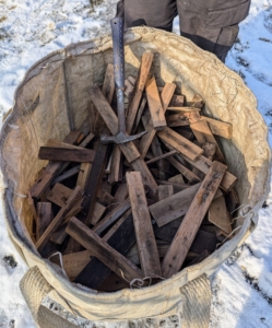 Even scraps of wood can be repurposed for various projects. Here, we cut wooden stakes into small strips. The strips are about six inches long – just long enough to accommodate two screws that will keep the burlap secure.