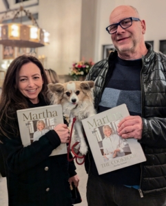 This couple brought their dog to the signing and purchased two books.