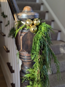 For the event, fresh greenery adorned every staircase and banister.