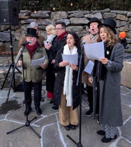 By late afternoon, carolers were outside practicing their selection of classic holiday songs.