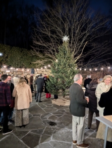 Soon, everyone was gathered around the tree.