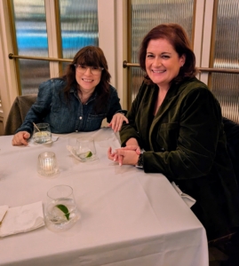 My Director of Brand Content Strategy Kim Dumer is sitting with My Executive Producer Amy Chiaro. Kim Dumer has also been working with me for many years.