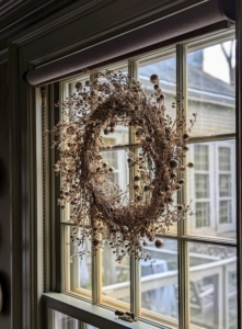 Here’s another wreath hung on a window looking out onto my courtyard.