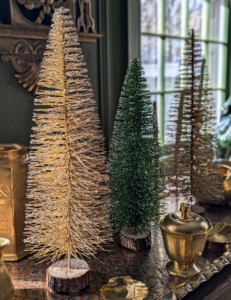 Green, silver, and copper bottlebrush trees adorn the table in my Green Parlor. If you recall, I developed these for my own holiday collection on QVC.