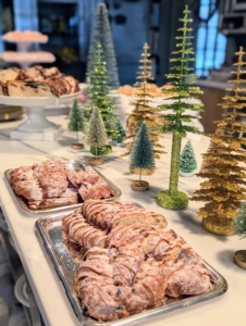 In my Winter House kitchen, I prepared a wonderful spread of food. Here are the trays of pre-sliced stollen, and Panettone.