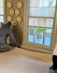 To help flatten the carpet, the edges are rolled in the opposite direction.