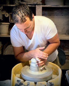 Ben has been crafting pots since 1999. Here he is at his potter's wheel in his home.