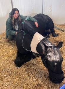 Bond remained in the hospital for three weeks. Here he is with Helen after one week. He slowly started to show signs of improvement.