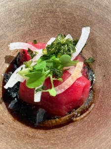 Next on the tasting menu was this Meiji Maguro Sashimi, or bluefin tuna, with garlic soy, sliced pearly onions, wasabi sprouts and crispy nori topped with micro cilantro.