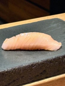 Sawara, also known as Spanish mackerel, is known for its whitish color, light meaty flavor, and opaque appearance. Here it is served with ponzu sauce.