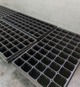 Ryan chooses all the necessary seed starting trays. These can be saved from year to year, so don’t throw them away after the season. Seed starting trays are available in all sizes and formations depending on seed needs.