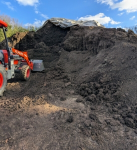 Another very big and important task that is done regularly around my farm is top dressing all the garden beds with nutrient-rich and protective compost. This is it! I make it right here in my compost yard.