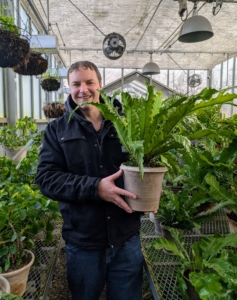 Every time Ben visits, he asks to walk through the greenhouse to see all the many clay containers he and his dad have made for me.