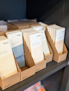 The Mast brothers have been selling their own chocolate since 2007. The cocoa bean is the primary ingredient in chocolate. Cocoa beans, or cacao beans, come from the Theobroma cacao tree – a fruit tree, whose name means “food of the gods”. The cacao beans, which are technically seeds, grow inside pods surrounded by a white fleshy pulp known as baba.