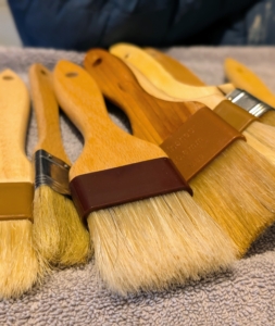 I also have a large assortment of basting brushes - some made with animal hair, some synthetic. I have wide ones and narrow ones. I also have silicone bristle brushes that are easier to clean and suitable for basic basting tasks.