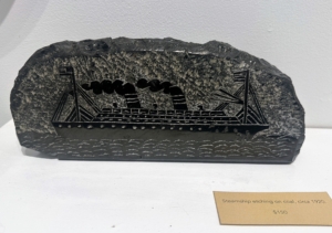 This was from the Evan Grant booth - a steamship etching on coal, circa 1920. Perhaps the artist was a sailor who carved it during his service on the ship.