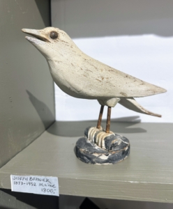 And this bird was made by Joseph Bernier, a French-Canadian lumberjack who was crippled by a fallen tree accident and started carving to support himself and his family. He wasn't a well-known artist, but some of his pieces have been shown in museums and other antiques shops.