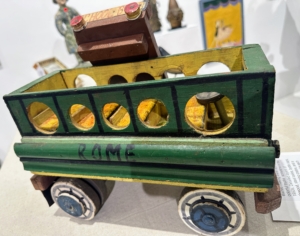 This toy truck was created with very detailed axels and wooden sides. Notice the seats - they're even "upholstered" with scraps of carpet.