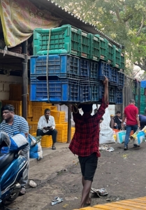 Indian street vendors are very adept. Many are seen carrying dozens of crates at a time.