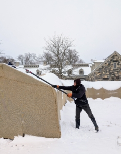 After it snows, my crew sweeps the snow off the burlap that covers most of the boxwood here at the farm. This time of year, I am very relieved the hedges and shrubs are protected. Heavy snow could splay the branches.