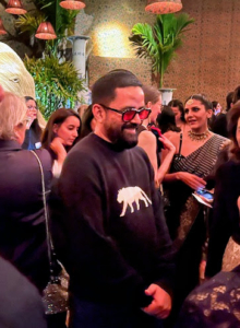 Here is Sabyasachi himself, wearing his signature Bengal tiger design on his black sweater welcoming everyone to his celebratory affair.