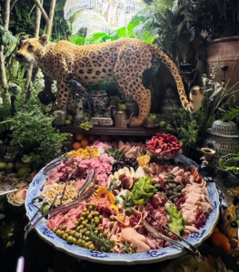 The buffet was so beautifully arranged. This platter includes mixed, berries, olives, a variety of cheeses and salted nuts, pitted prunes, and other dried and fresh fruits.