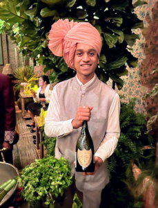 Wait staff dressed in traditional pink turbans served Dom Perignon to hundreds of guests.