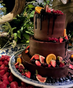 This is a decadent Belgian dark chocolate cake embellished with fresh fruits.