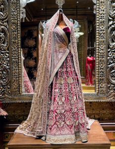 Gowns are elaborate and include traditional shades of white and ivory as well as reds and maroons.