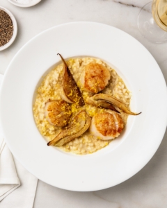 I like to serve risotto dishes at my own dinner gatherings. This one is Lemon Risotto with Sea Scallops and caramelized fennel.