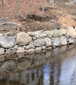 And then the rocks were placed strategically and thoughtfully to bolster the walls of the pond.