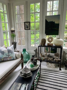 Up the stairs and inside is an inviting room filled with many of Patsy’s “finds.”