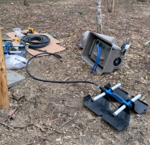 Next, an aerating system is installed to keep the water moving and to control mosquitoes, minimize algae, and increase oxygen for pond wildlife.