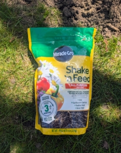 I use Miracle-Gro Shake ‘n Feed All Purpose Plant Food. It contains all the essential nutrients to nourish the boxwood above and below the soil.