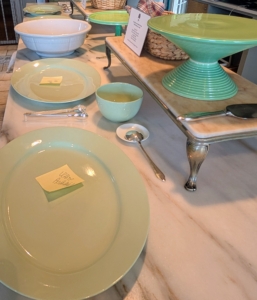 In my kitchen, serving platters, bowls and other necessary utensils are laid out. This can be done at any time to ensure the right pieces are pulled for the right foods. It also saves any rush for items when it comes time to serving.