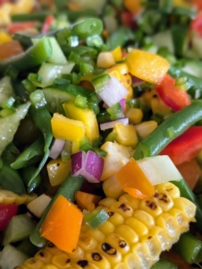 This is a rendition of my daughter Alexis's Chopped Salad - also found in my 100th book, MARTHA: THE COOKBOOK. It includes at least 10 different vegetables, depending on what is available, and a light dressing of rice vinegar and olive oil.