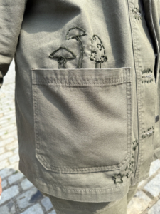 Before coming to the event, Carey embellished the Garden Chore Jacket with some embroidery...