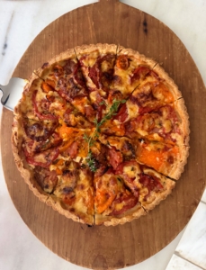 This vegetarian entrée is a rich and savory tomato tart.
