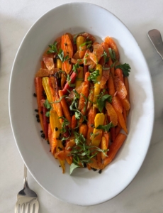 The rest of the dishes were served buffet style in my kitchen. This platter is filled with a variety of different carrots roasted to perfection and then dressed with herbs, capers, and slices of blood orange.