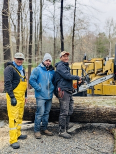 Here are three members of my outdoor grounds crew, Cesar, Adan, and Pesang. They were preparing to clear the tree when they came across something very special...