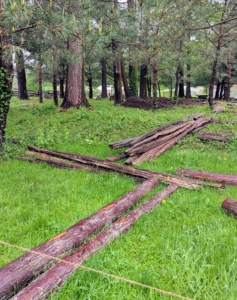 The area was already half fenced, so my outdoor grounds crew needed to put up two more sides of fencing. I instructed them where the fence would go and then all the necessary antique fencing rails were carefully delivered to the site.