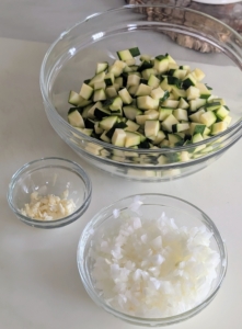 All the chopped ingredients are set aside. This preparation is called "mise en place" - a French culinary term that means "everything in its place." It refers to the practice of preparing and organizing all the ingredients and equipment before cooking begins, so everything is ready promoting efficiency and order in the kitchen.
