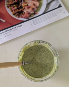 Finally, in a small bowl, Enma mixes the basil pesto and mayonnaise. Everything is now ready to plate and serve.