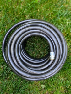 And here’s a tip… to keep it from kinking, when it’s new stretch it along a path or the edge of the lawn and then loop the business end back to the tap.