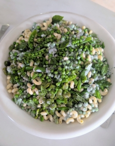 And, look at the wonderful green colors of this pasta salad - filled with peas and fava beans from my garden - just picked hours before. The pasta salad is mixed with a light dressing of buttermilk, herbs, lemon, a bit of mayonnaise and crème fraîche, salt, and pepper.