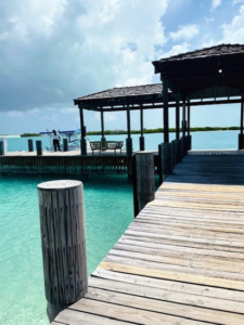 During this time of year, the Turks and Caicos weather is generally sunny with temperatures in the 80s. It was just a short distance to the dock where the Captain was preparing the boat for departure.