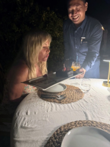 ... complete with cake. Here she is making her birthday wish.
