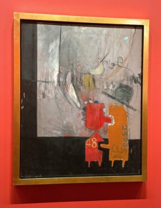 David's works in this display span several decades. This is called David Hockney, "Adhesiveness," 1960. David is one of the leading figures of the pop art movement of this time.