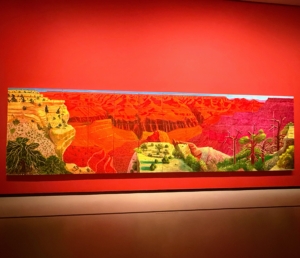 Here is David Hockney, "A Bigger Grand Canyon," 1998. David uses vibrant colors, varying techniques, and themes inspired by his own personal observations, surroundings, and experiences.