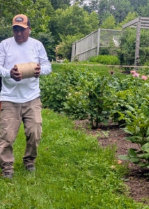 Next, Pete stretches the twine from one end to the other...